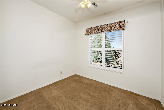 unfurnished room featuring carpet and ceiling fan