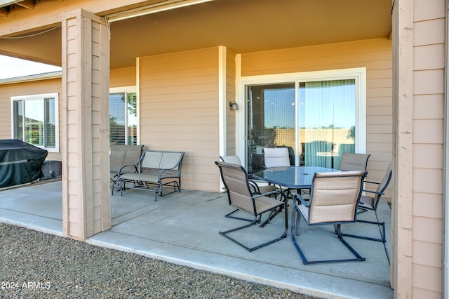 view of patio featuring a grill