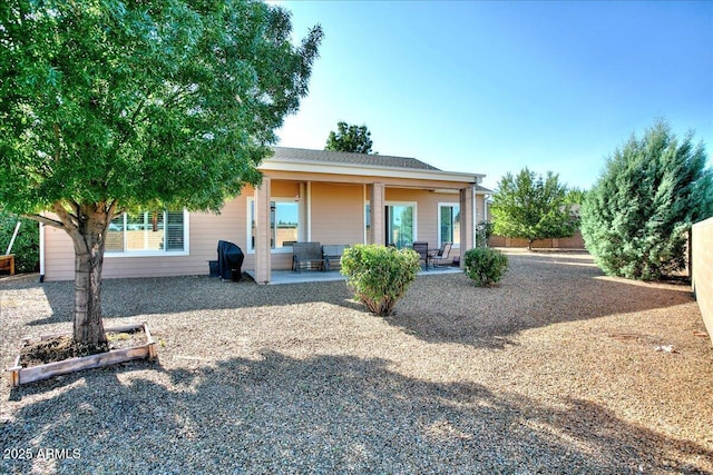 view of front of home featuring a patio