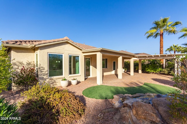 back of house featuring a patio