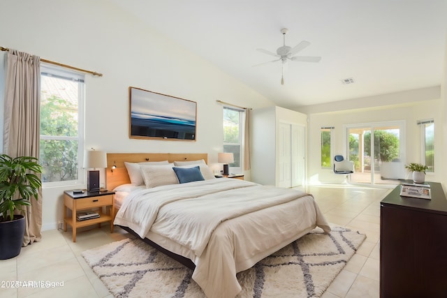 tiled bedroom featuring multiple windows, vaulted ceiling, access to outside, and ceiling fan