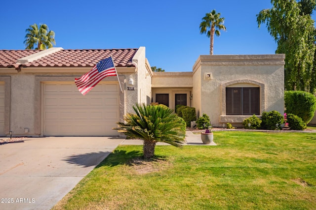 mediterranean / spanish house with a garage and a front lawn