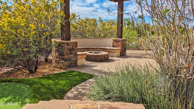 exterior space with an outdoor fire pit