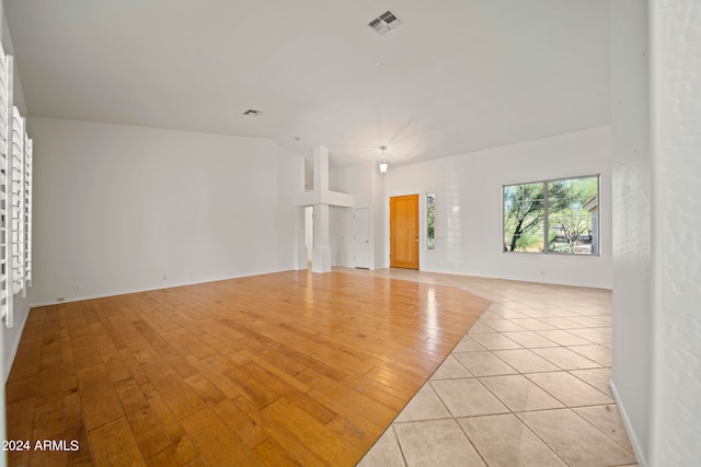 unfurnished room with light wood-type flooring