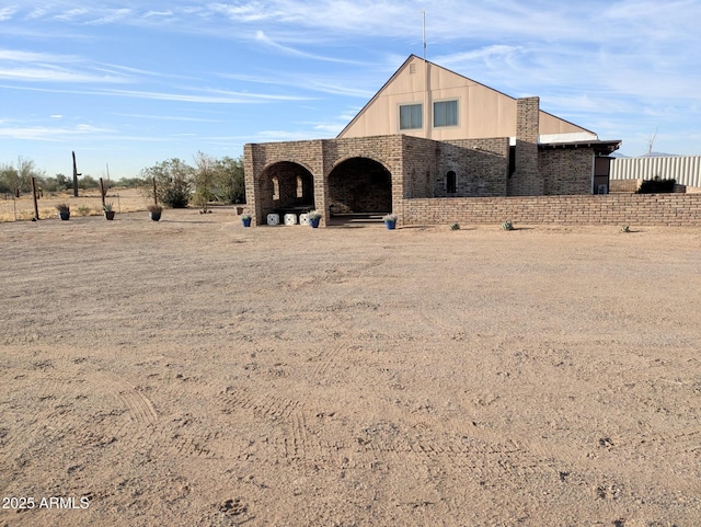 exterior space with brick siding