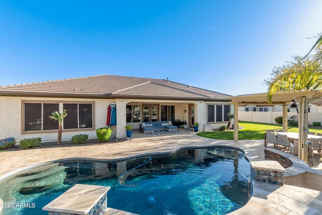 rear view of house with a patio, a fenced in pool, stucco siding, outdoor lounge area, and a tile roof