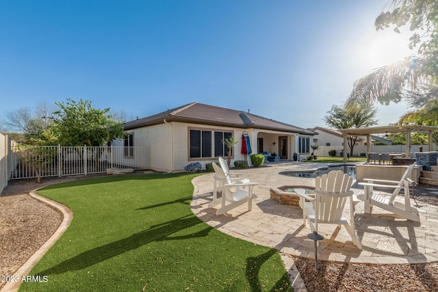 back of house featuring stucco siding, a pergola, a fenced backyard, an outdoor fire pit, and a patio area