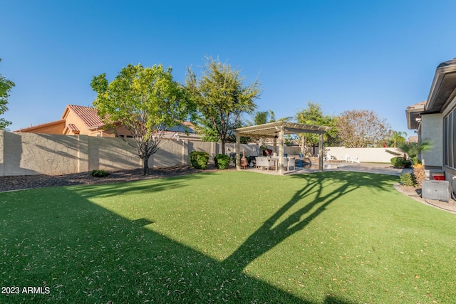 view of yard with a patio, a fenced backyard, and a pergola