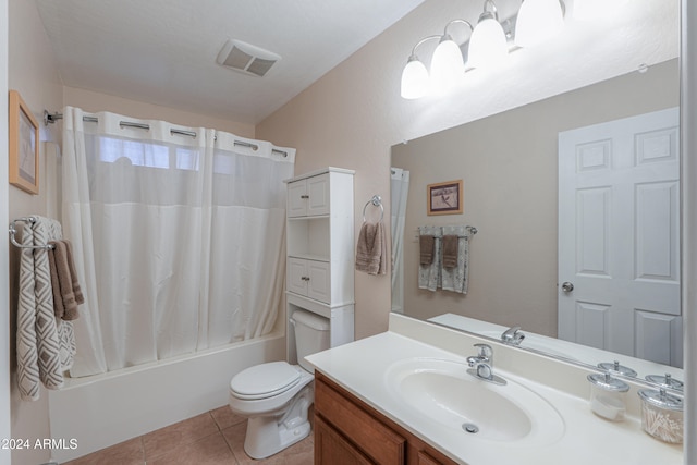 full bathroom featuring tile patterned flooring, shower / bath combination with curtain, toilet, and vanity