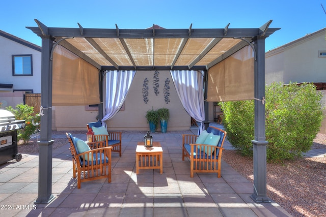 view of patio featuring an outdoor living space, a grill, and a pergola