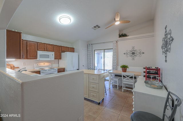 kitchen featuring kitchen peninsula, backsplash, white appliances, vaulted ceiling, and light tile patterned flooring