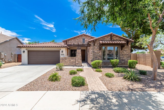 view of front of home with a garage