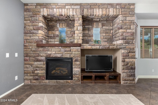 interior space featuring a stone fireplace