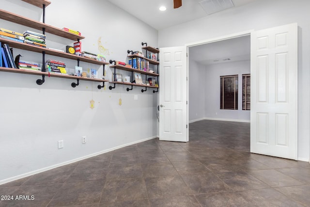 spare room featuring ceiling fan