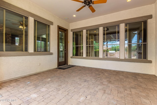 view of patio / terrace featuring ceiling fan