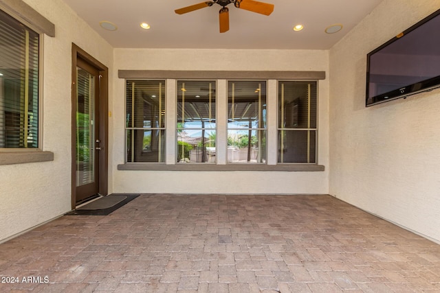 view of patio / terrace featuring ceiling fan