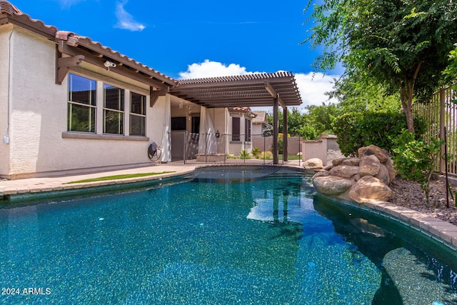 view of swimming pool featuring a pergola