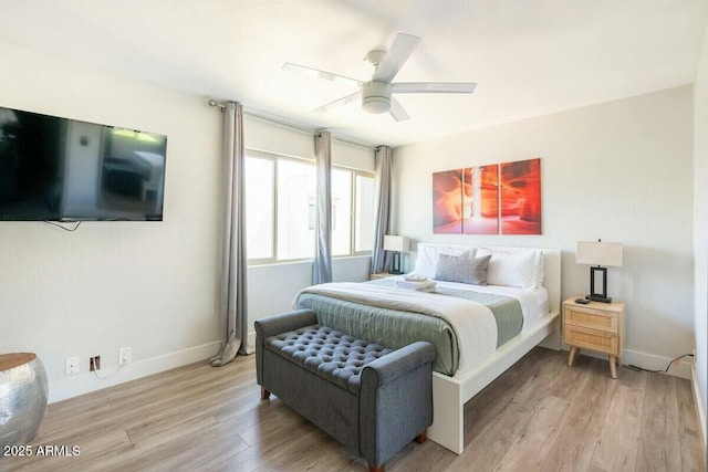 bedroom featuring ceiling fan and light wood-type flooring