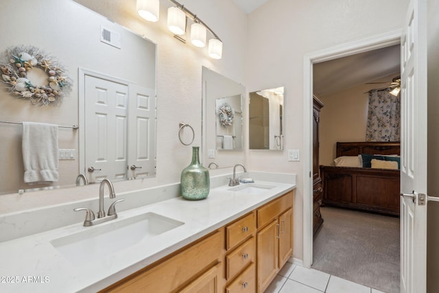 4918 W Wahalla Ln, Glendale, AZ 85308 - ensuite bathroom with tile patterned floors and double vanity