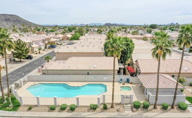 4918 W Wahalla Ln, Glendale, AZ 85308 - community pool featuring a residential view, a fenced backyard, a mountain view, and a patio