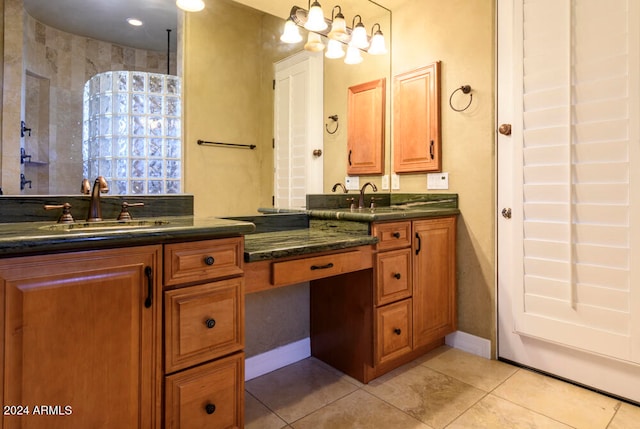 bathroom with tile patterned flooring and vanity