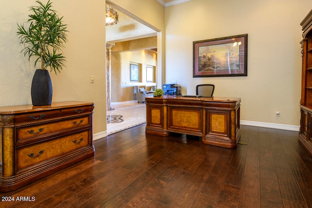 office space featuring crown molding and dark hardwood / wood-style flooring