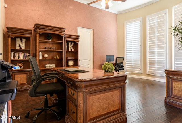 home office featuring dark hardwood / wood-style floors, ceiling fan, and ornamental molding