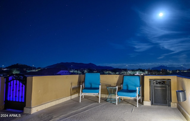 patio at twilight with a mountain view