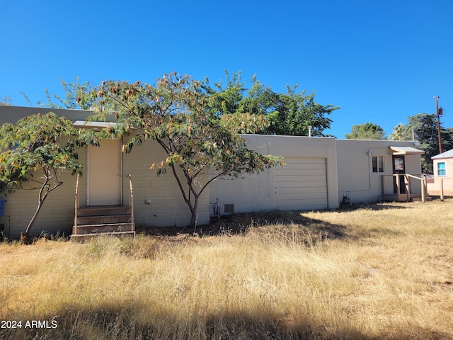 exterior space featuring a garage