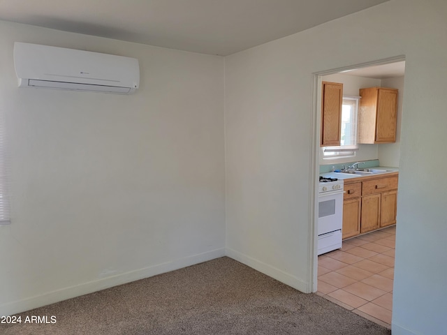 kitchen featuring light colored carpet, sink, white range with gas cooktop, and a wall mounted air conditioner