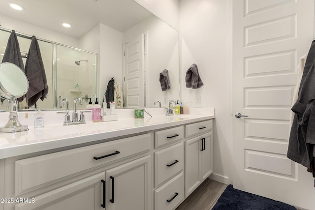12505 W Kaler Dr, Glendale, AZ 85307 - full bath featuring double vanity, recessed lighting, and a shower stall