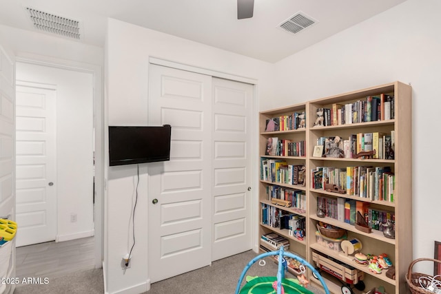 12505 W Kaler Dr, Glendale, AZ 85307 - recreation room featuring ceiling fan and carpet floors