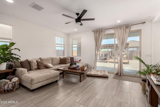 12505 W Kaler Dr, Glendale, AZ 85307 - living area with a ceiling fan, recessed lighting, and light wood-style floors