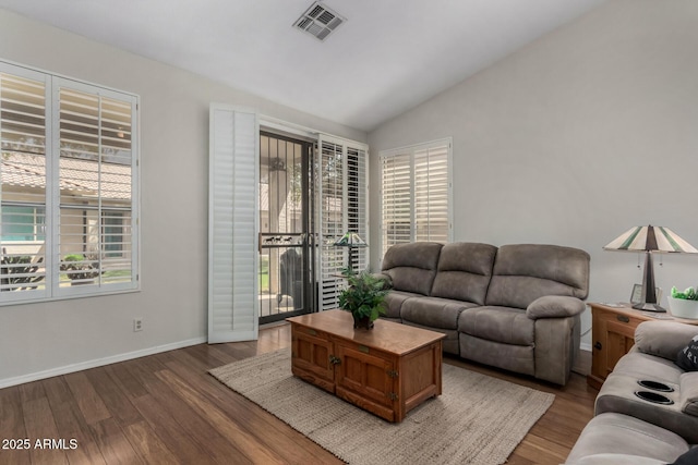 23813 S Pleasant Way, Sun Lakes, AZ 85248 - living area featuring visible vents, wood finished floors, a wealth of natural light, and vaulted ceiling