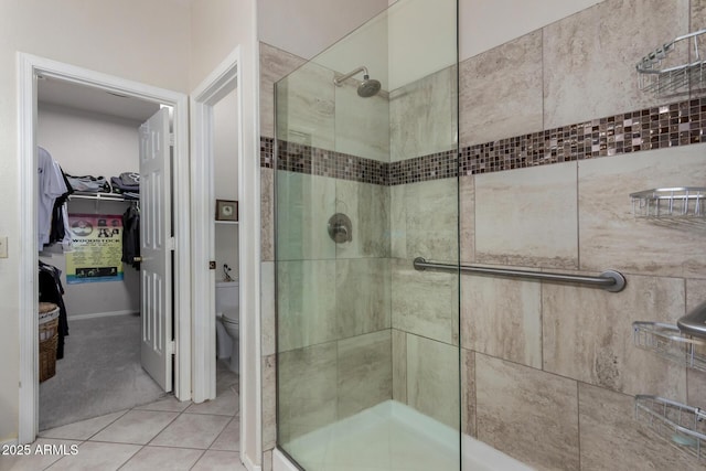 23813 S Pleasant Way, Sun Lakes, AZ 85248 - full bath with tile patterned flooring, a spacious closet, toilet, and a shower stall