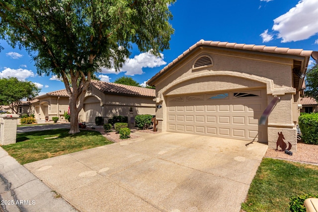 23813 S Pleasant Way, Sun Lakes, AZ 85248 - mediterranean / spanish house featuring a garage, a tiled roof, driveway, and stucco siding