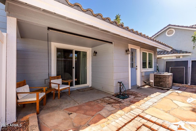 view of patio featuring central AC unit