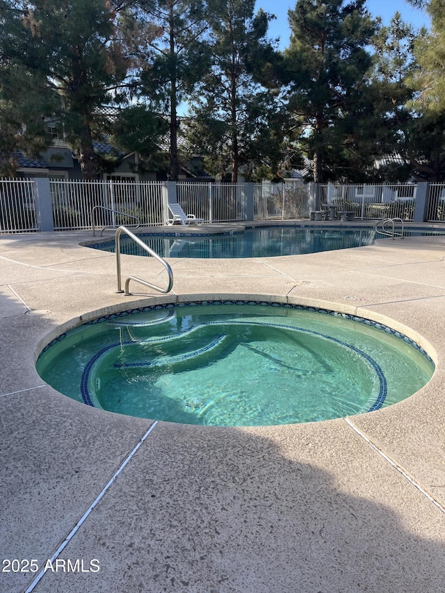 view of pool featuring a patio area