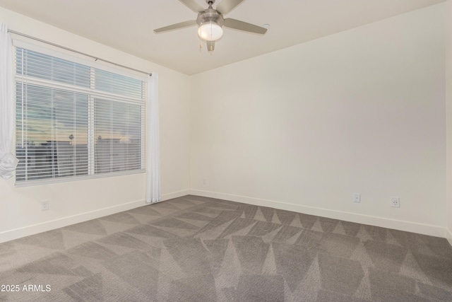 unfurnished room featuring carpet and ceiling fan