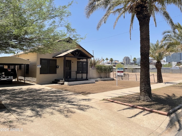 1017 E Taylor St, Phoenix, AZ 85006 - bungalow featuring concrete driveway and a carport