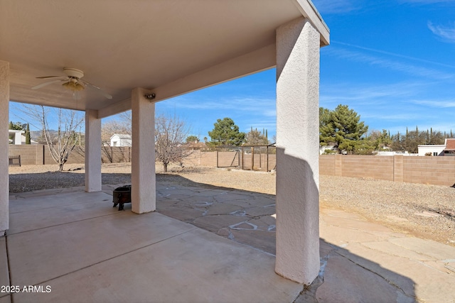 view of patio / terrace with ceiling fan and a fenced backyard