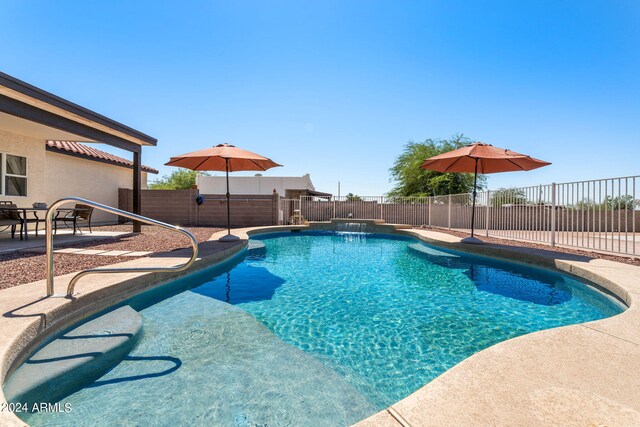 view of pool featuring a patio area