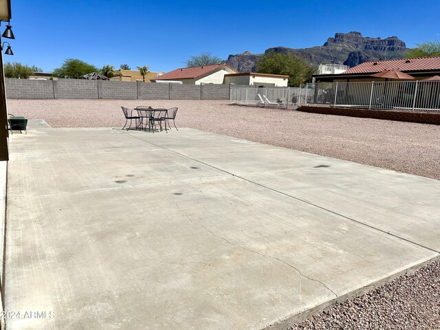 view of patio / terrace with a mountain view