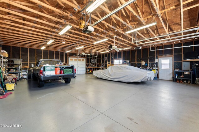 garage featuring a garage door opener