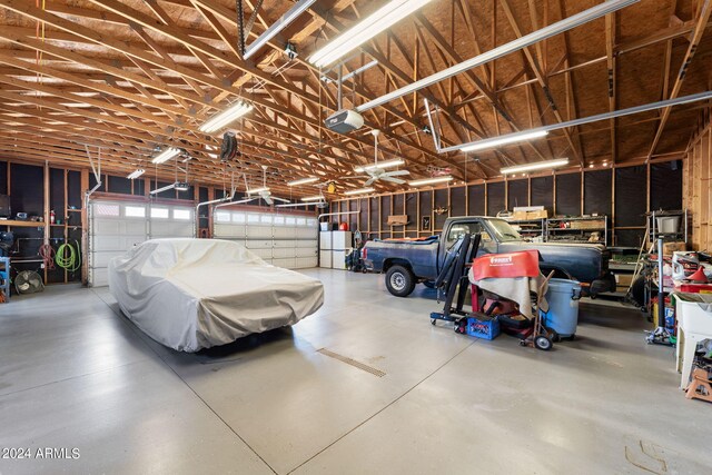 garage featuring a garage door opener