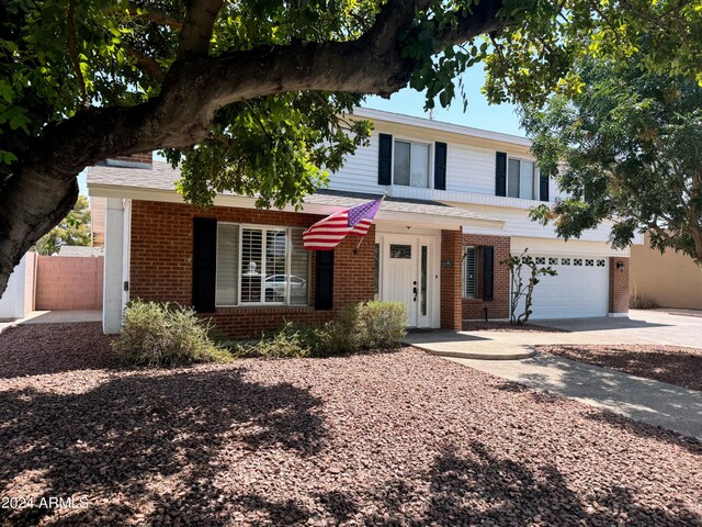 view of front of home with a garage