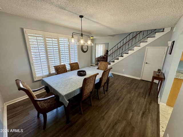 dining space featuring stairs, dark wood-style flooring, and baseboards