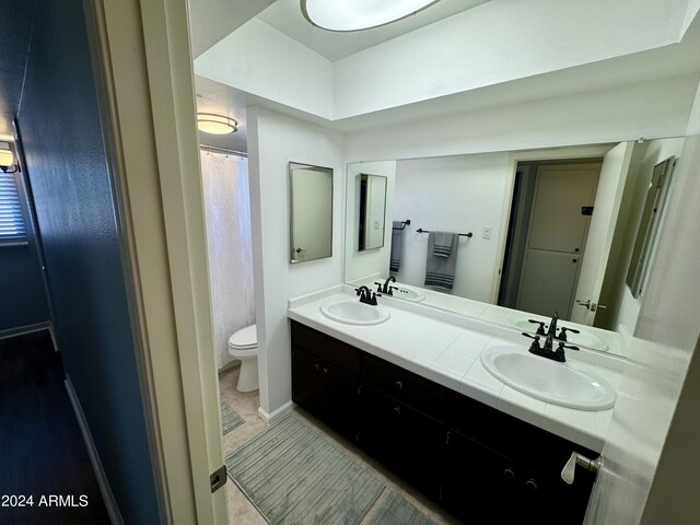 bedroom with ceiling fan, a textured ceiling, and carpet floors