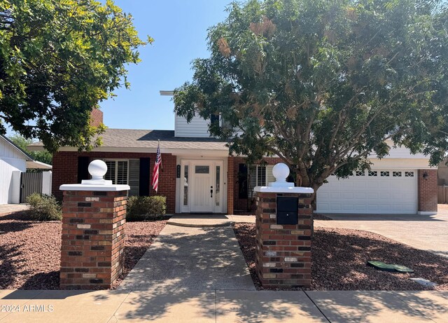 view of front of property featuring a garage