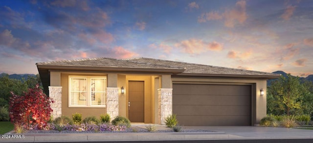 prairie-style home with a garage